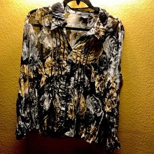 Beautiful sparkly blouse  . I’d say med / large
